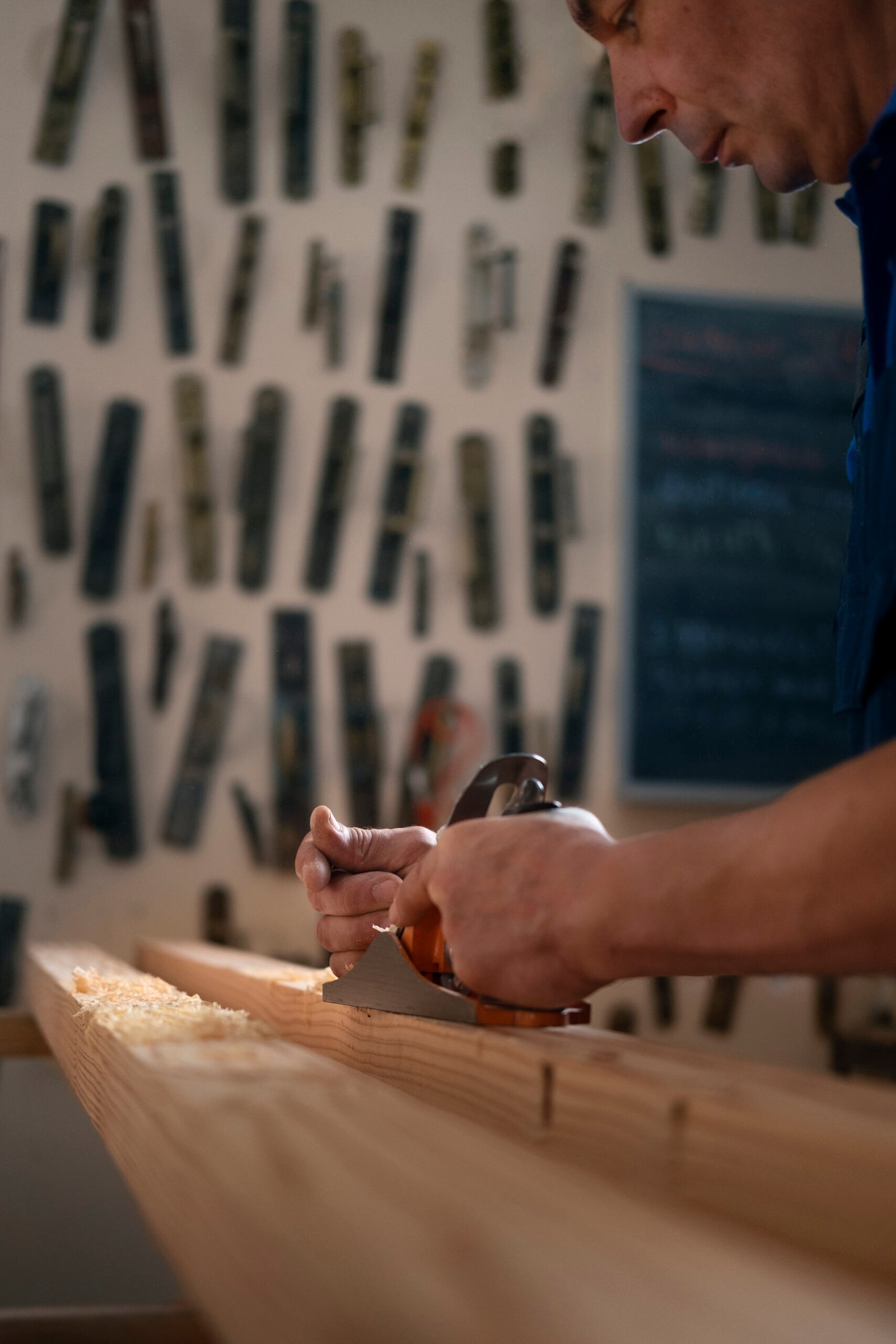 male-wood-worker-his-shop-working-with-tools-equipment